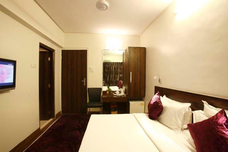 Hotel Plaza Bombaim Quarto foto